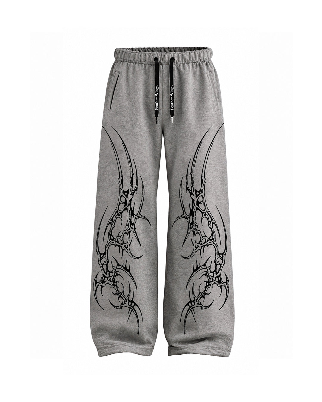 gray sweatpants with a black tribal wing graphic printed down both legs, featuring an elastic waistband and black drawstrings.
